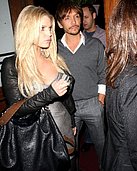 Jessica Simpson bends over and exposes her juicy cleavage in these pics