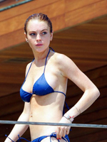 Fashion pics and a paparazzi photo of Lindsay in a sexy swimsuit